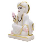 White statue with golden accents