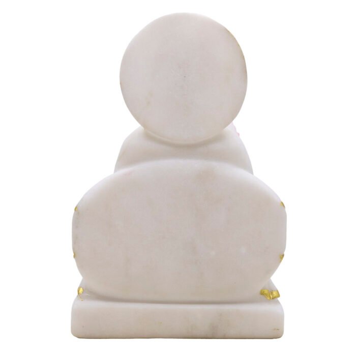 White marble statue with gold accents