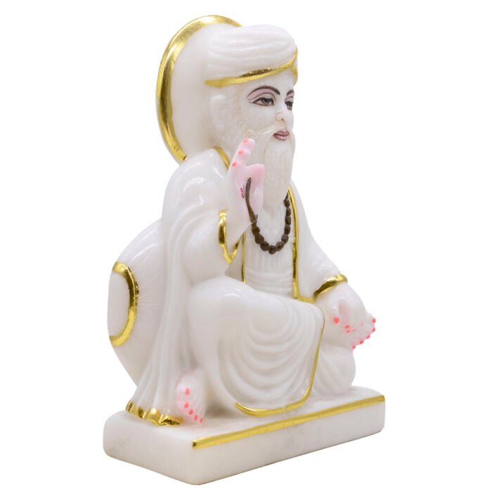 White statue with gold accents